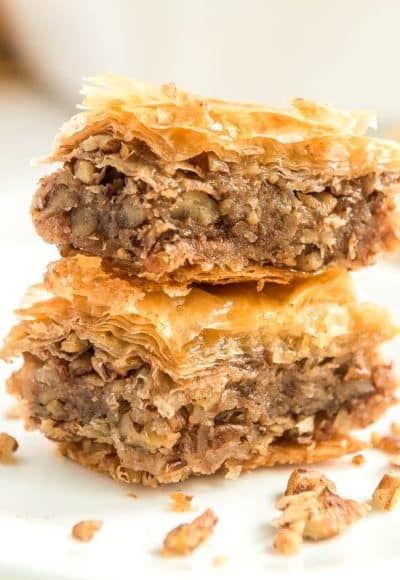 Two pieces of Baklava stacked on top of each other.