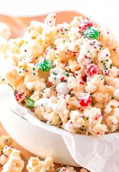 Close up photo of Christmas Popcorn in a small white bowl.