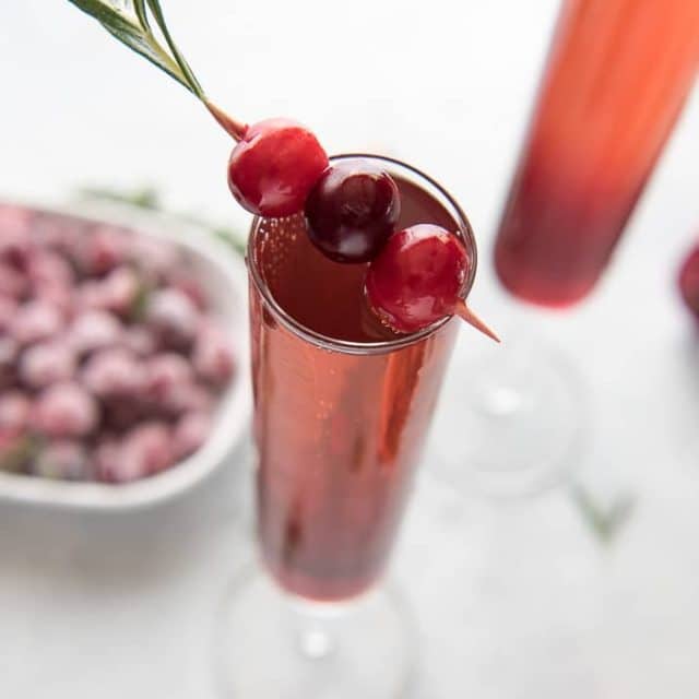 Cranberry Pomegranate Champagne Cocktail - Sugar and Soul