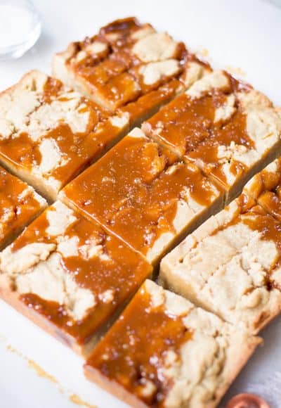 These Easy Salted Caramel Blondies, with layers of sweet vanilla and rich salted caramel flavor, are the epitome of decadence and the perfect dessert to make as we transition into fall!