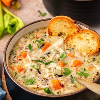 Close up of a bowl of chicken and wild rice soup.