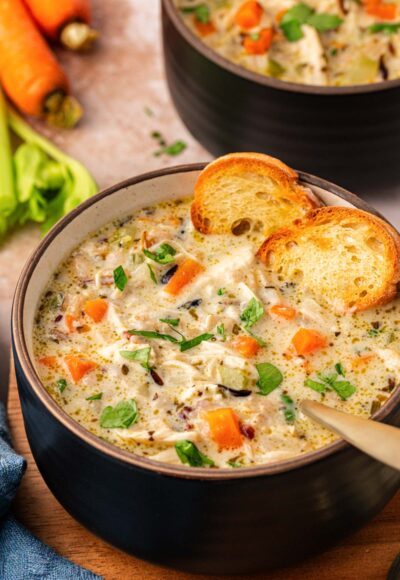 Close up of a bowl of chicken and wild rice soup.