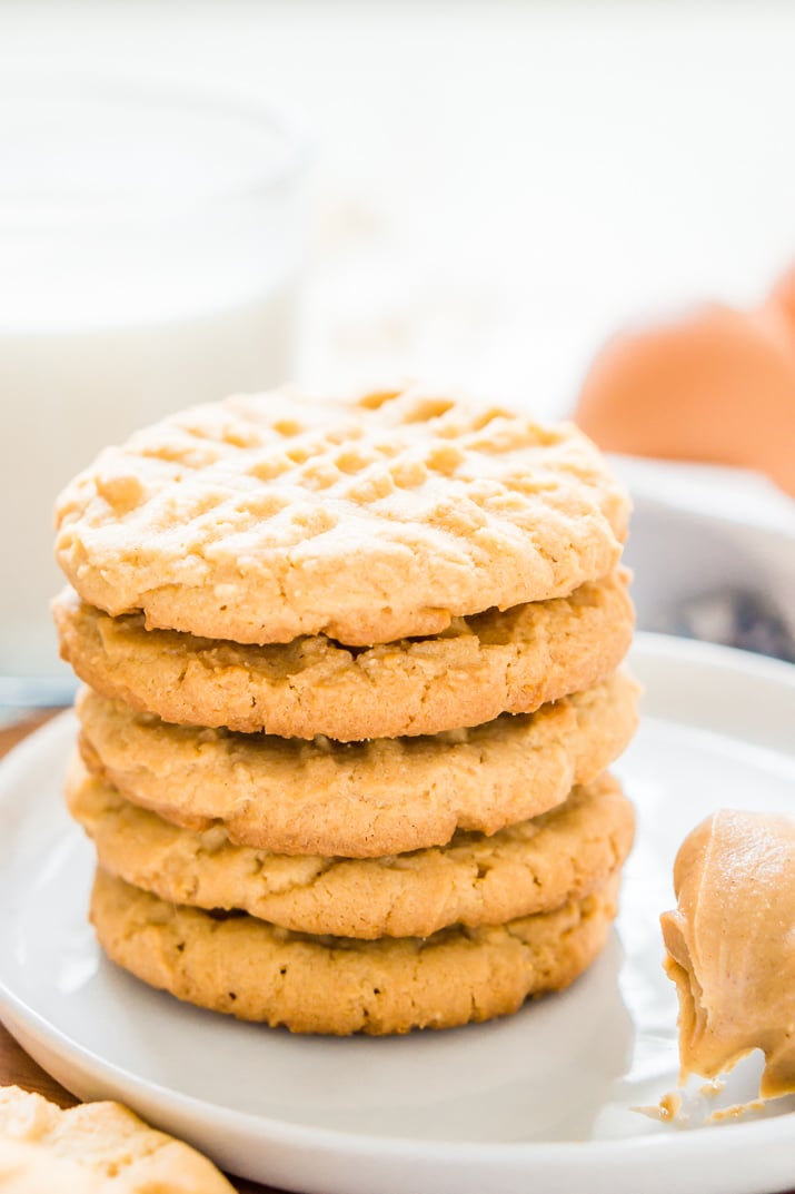 These Peanut Butter Cookies are the classic cookie you all know and love with a secret ingredient that leaves them extra chewy and delicious!