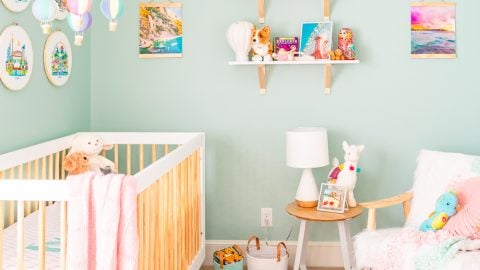 This Travel Themed Nursery is filled with simple and stylish inspiration for a baby girl's room! With custom pieces, modern furniture, and global decor!