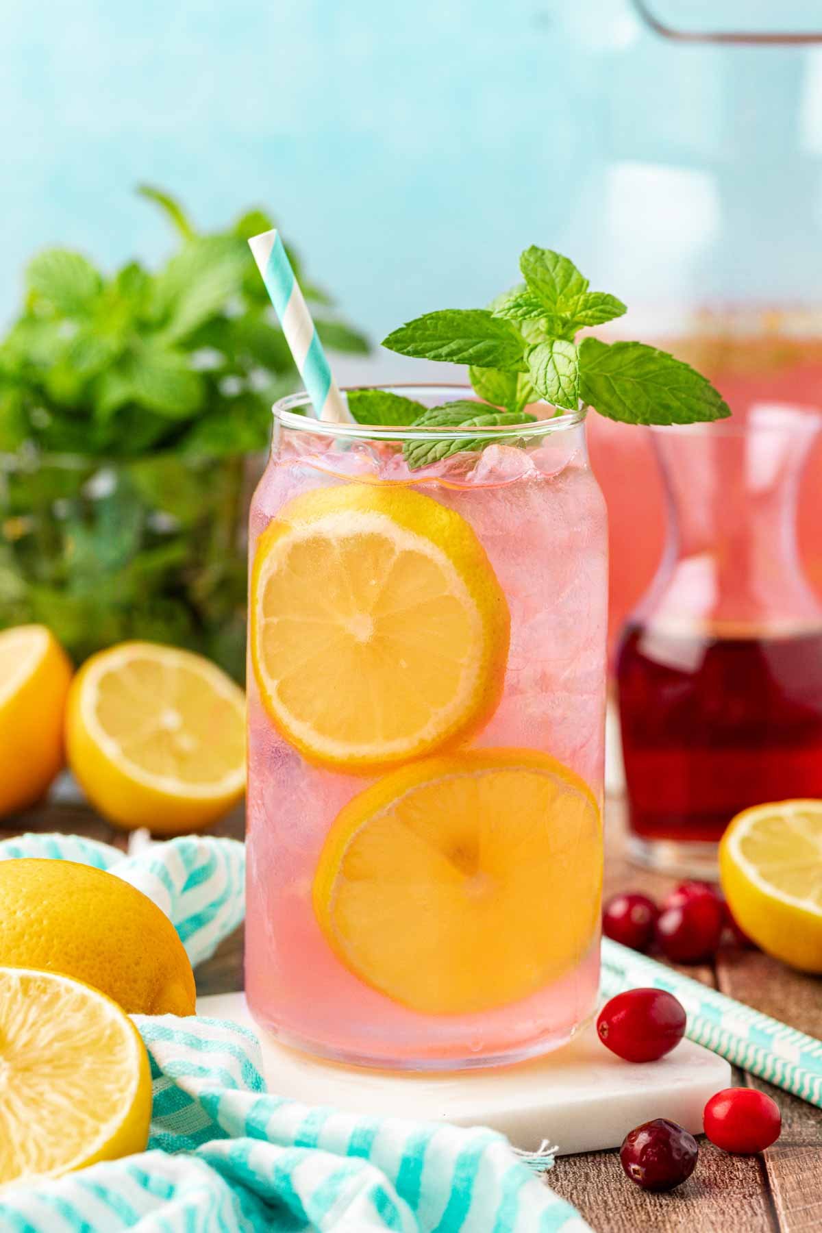 Close up of a glass filled with homemade pink lemonade.