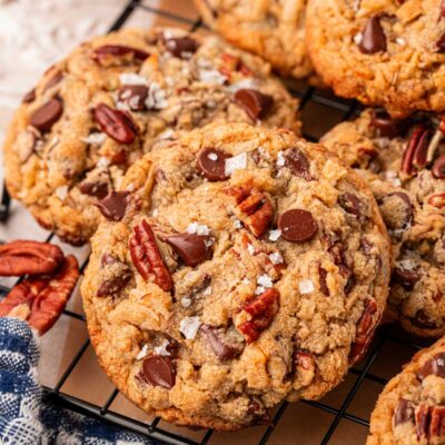 Cowboy Cookies on a wire rack.