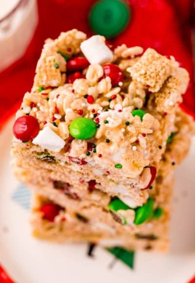 Close up photo of a stack of rice krispie treats with m&ms.