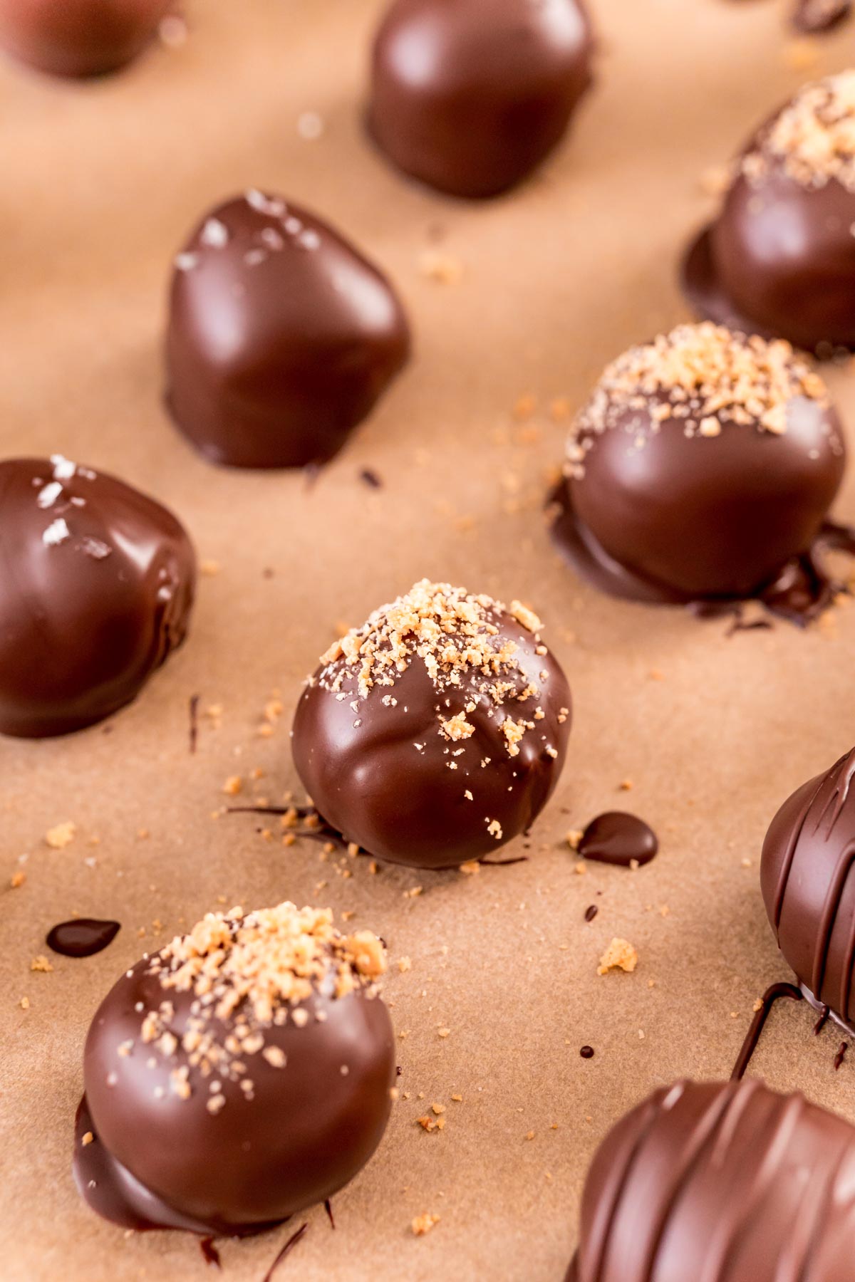 Peanut Butter Balls on a parchment lined baking sheet.