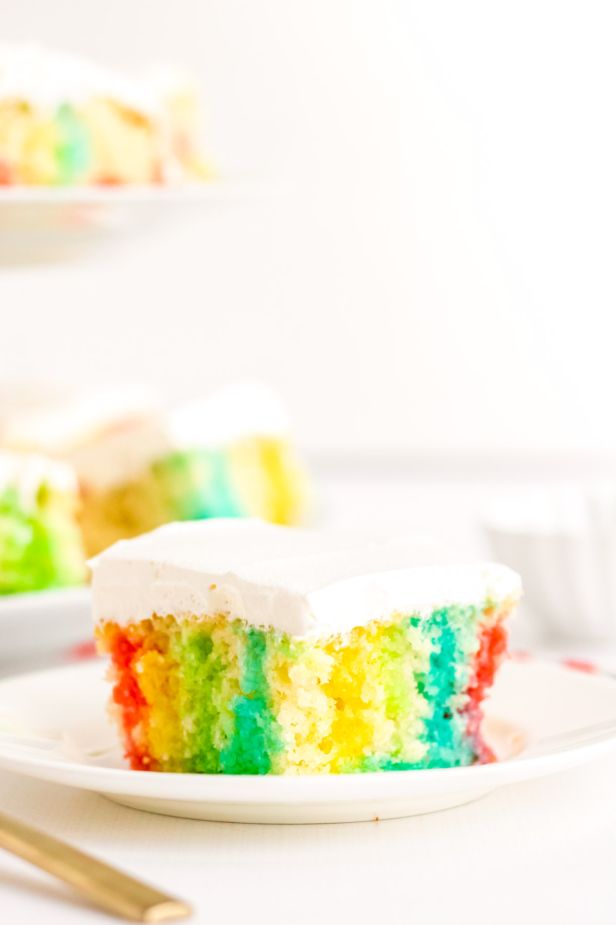 Easy Rainbow Jello Poke Cake - Sugar and Soul Co