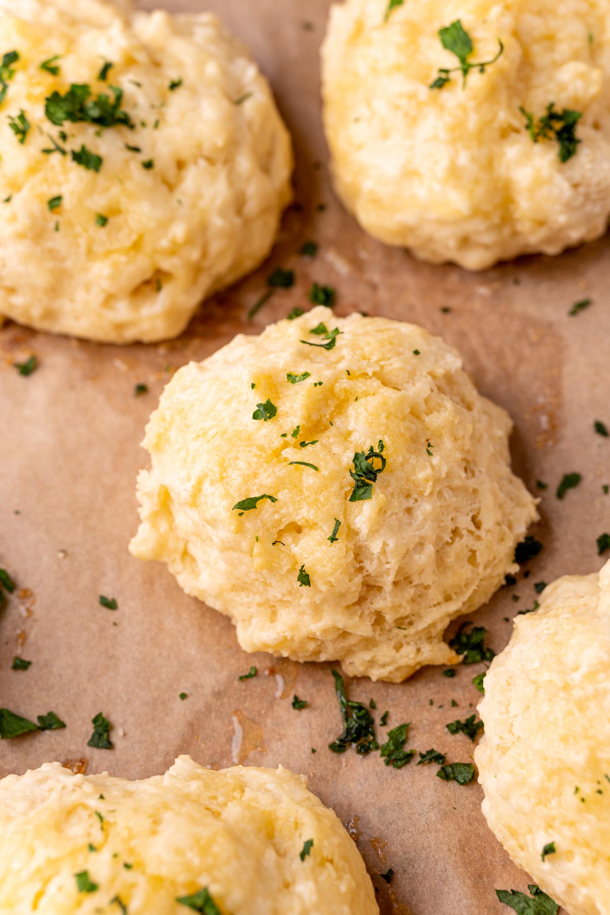 Drop biscuits on a parchment lined baking sheet.