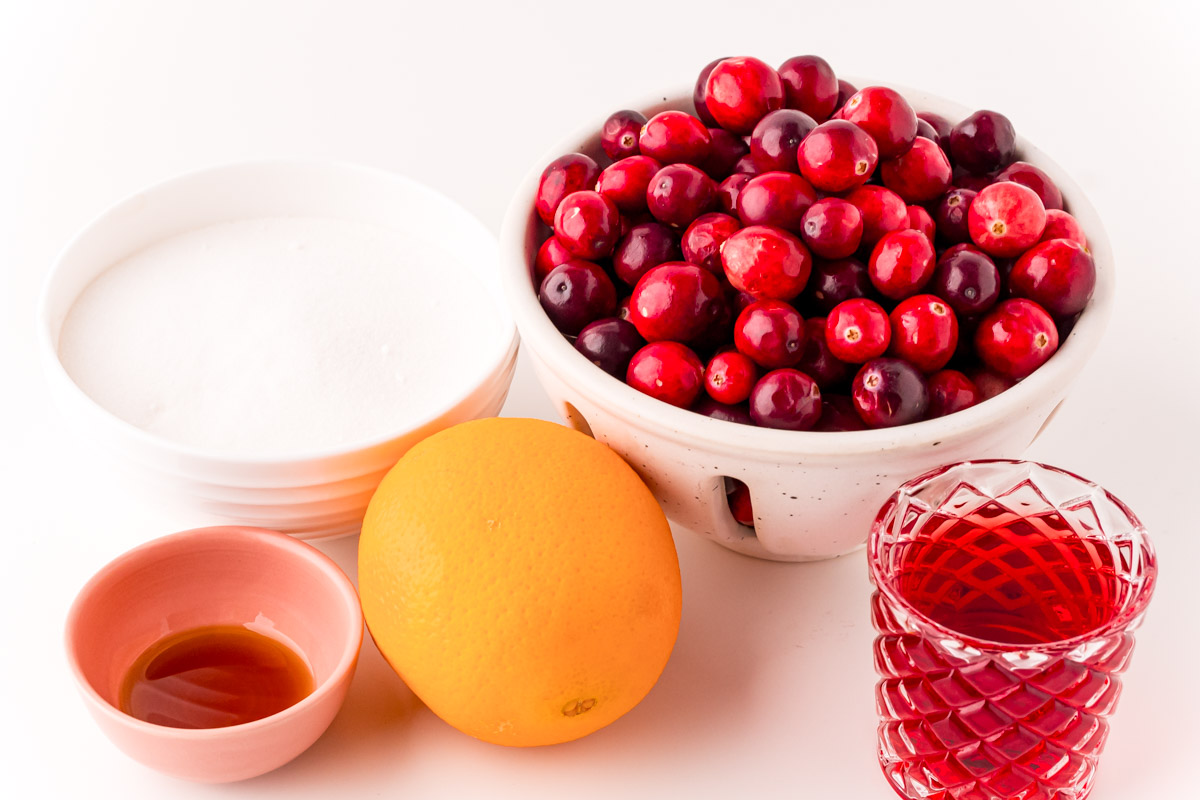 Close up photo of ingredients prepared to make cranberry sauce.