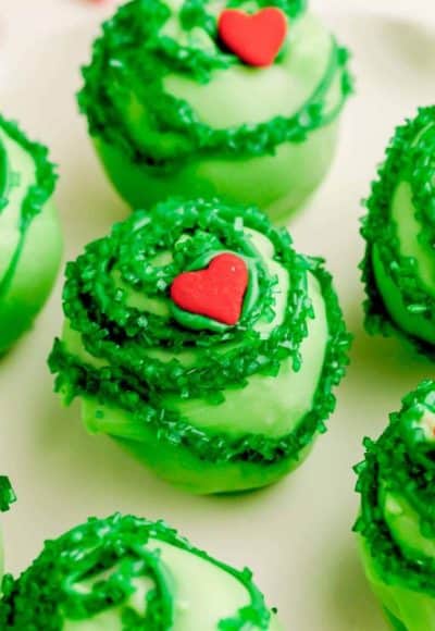 Close up photo of Grinch Cake Balls.