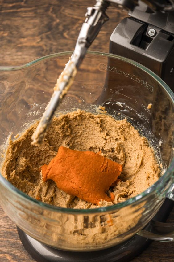 Pumpkin puree in creamed butter and sugar.