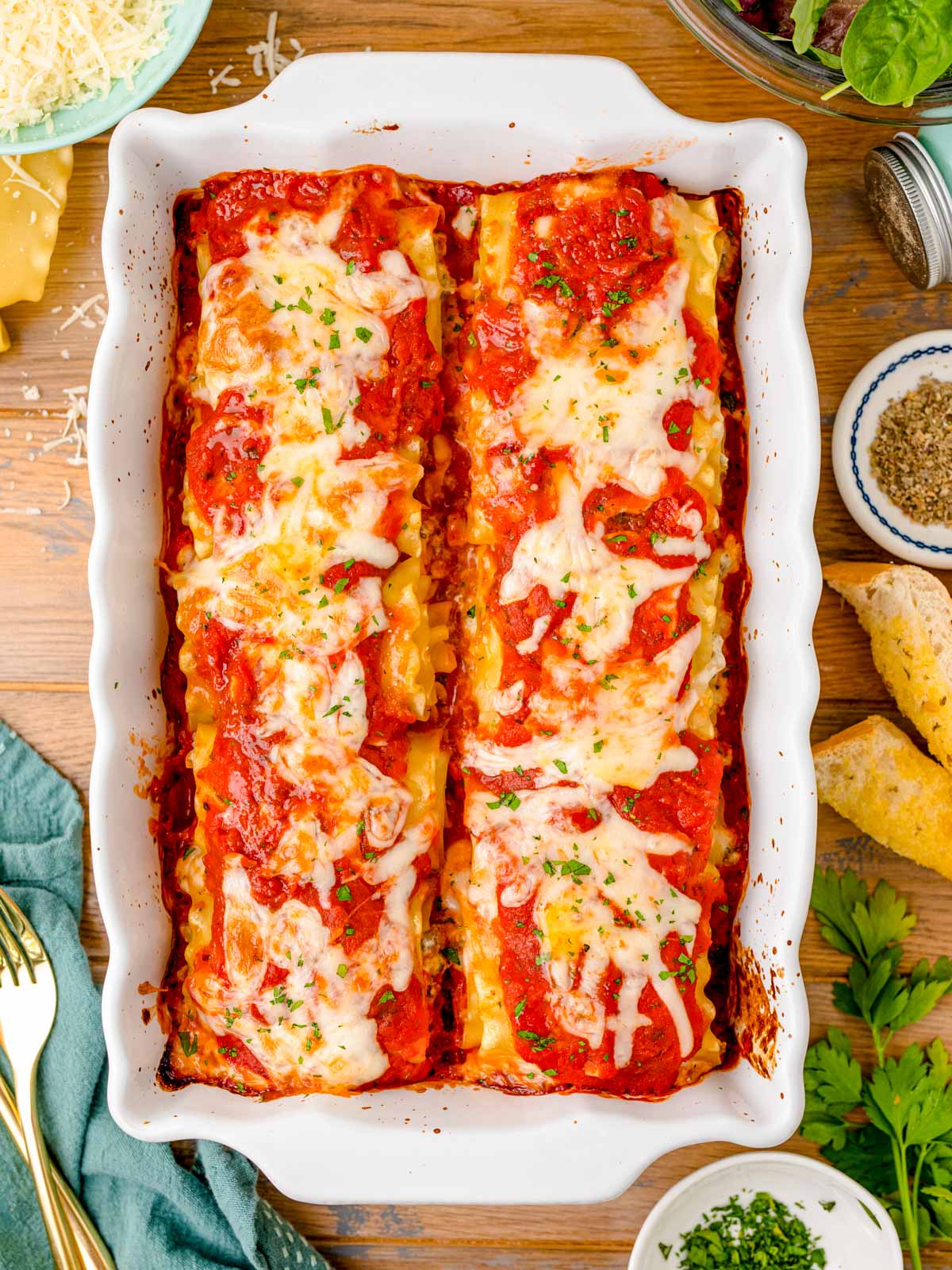 Overhead photo of lasagna roll-ups in a baking dish.