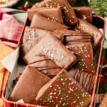 Chocolate covered graham crackers in a cookie tin.