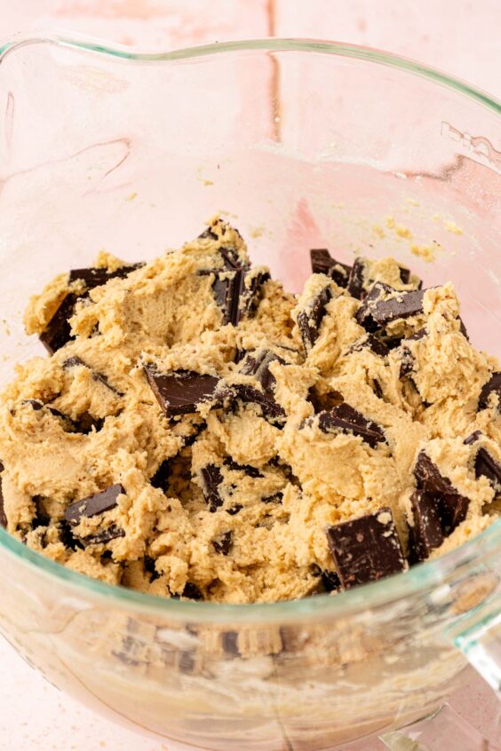 Chocolate chunk cookie dough in a bowl.