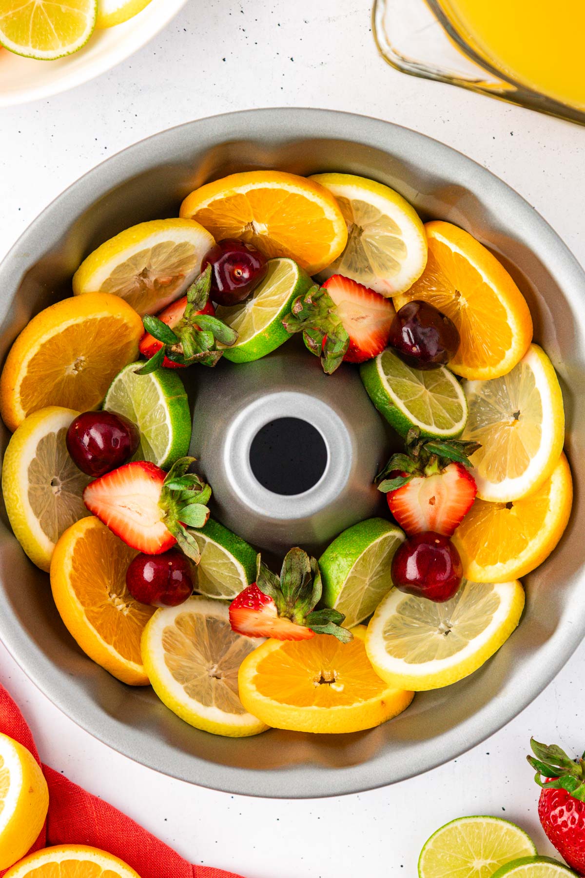 Fruit in a bundt pan ready to make an ice ring.