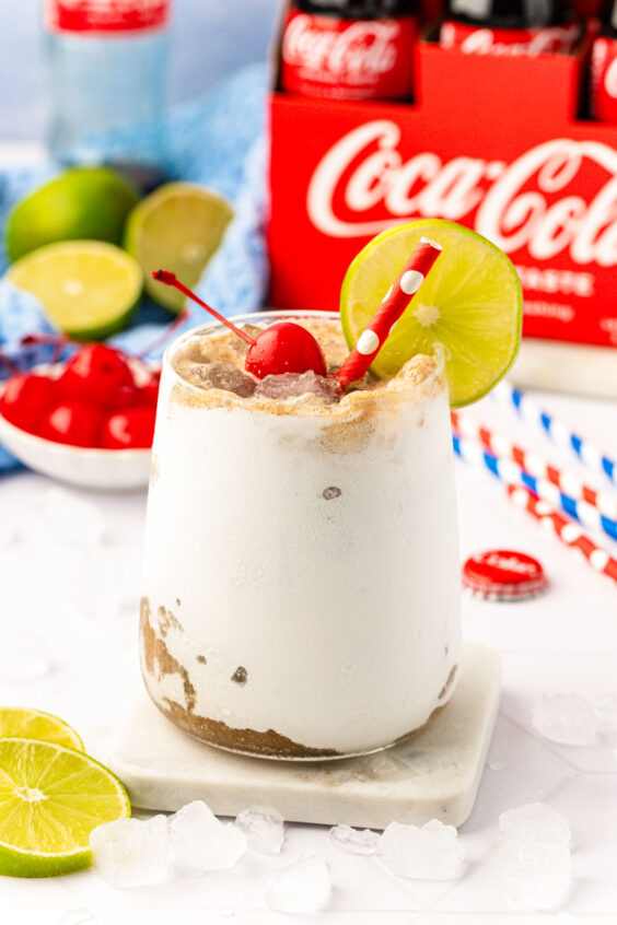 Close up of a Fluffy Coke on a marble coaster.