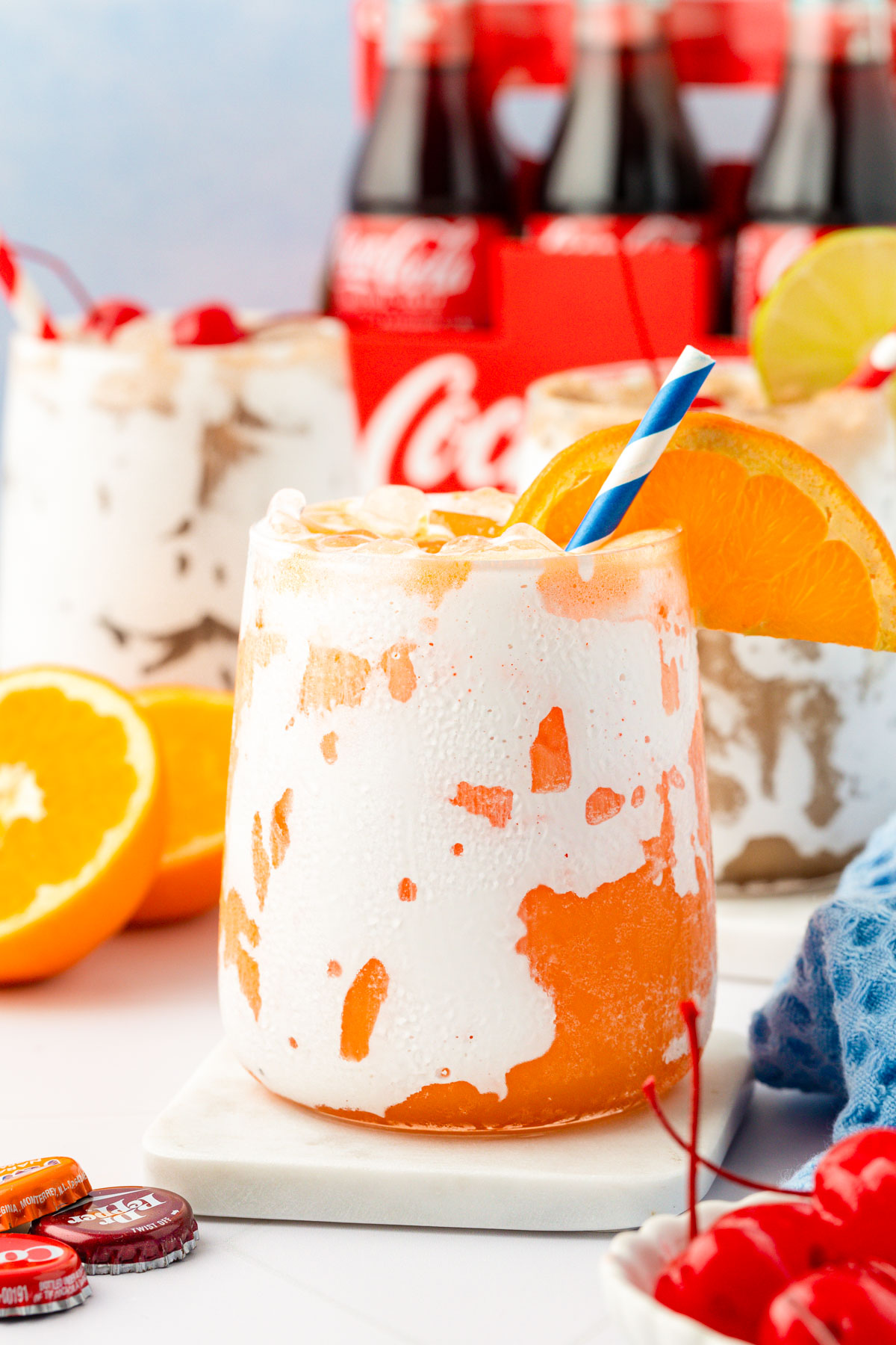 Close up of three glasses on fluffy soda.