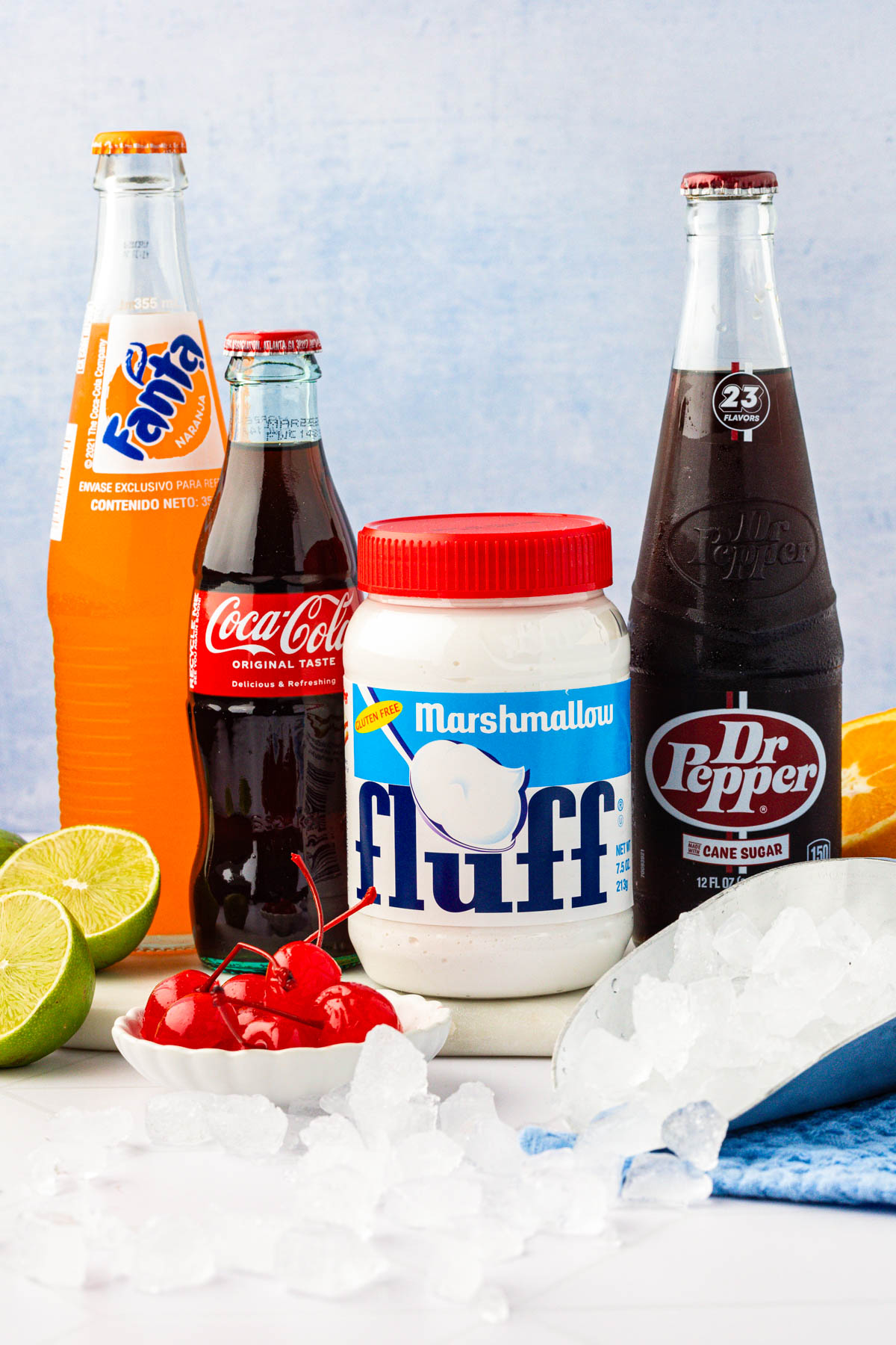 Ingredients to make fluffy soda on a table.