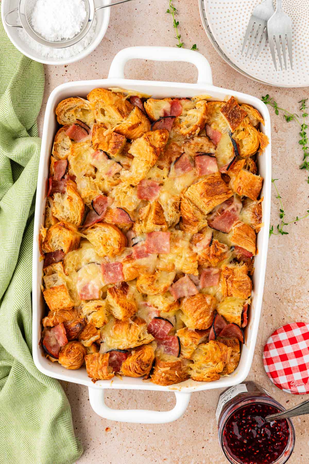 Overhead photo of a casserole made with ham, cheese, and croissants.