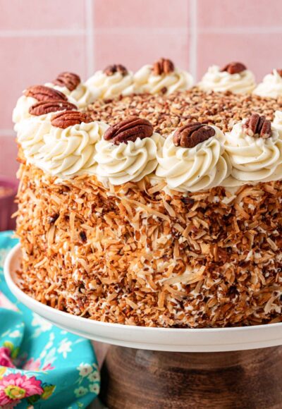 Close up of an Italian Cream Cake on a cake stand.