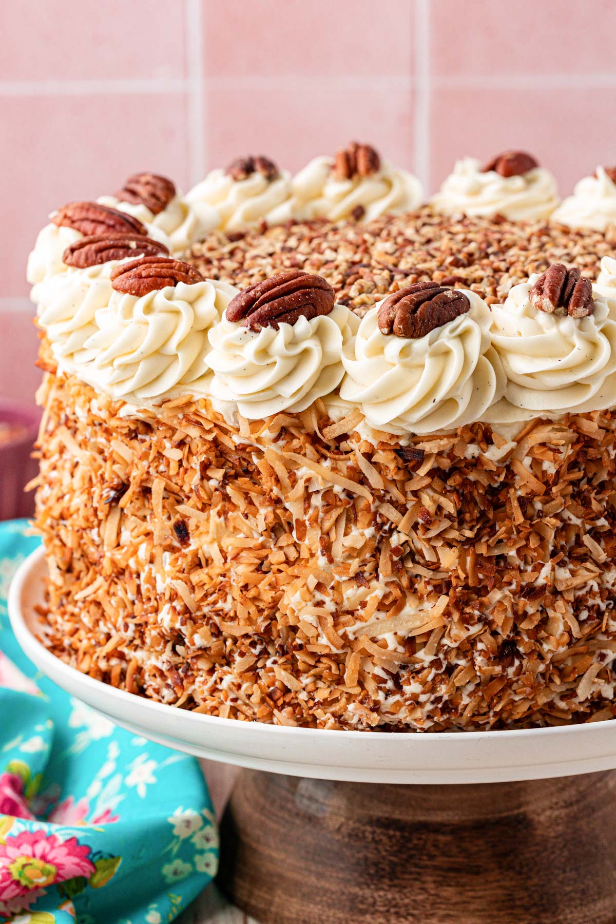 Close up of an Italian Cream Cake on a cake stand.