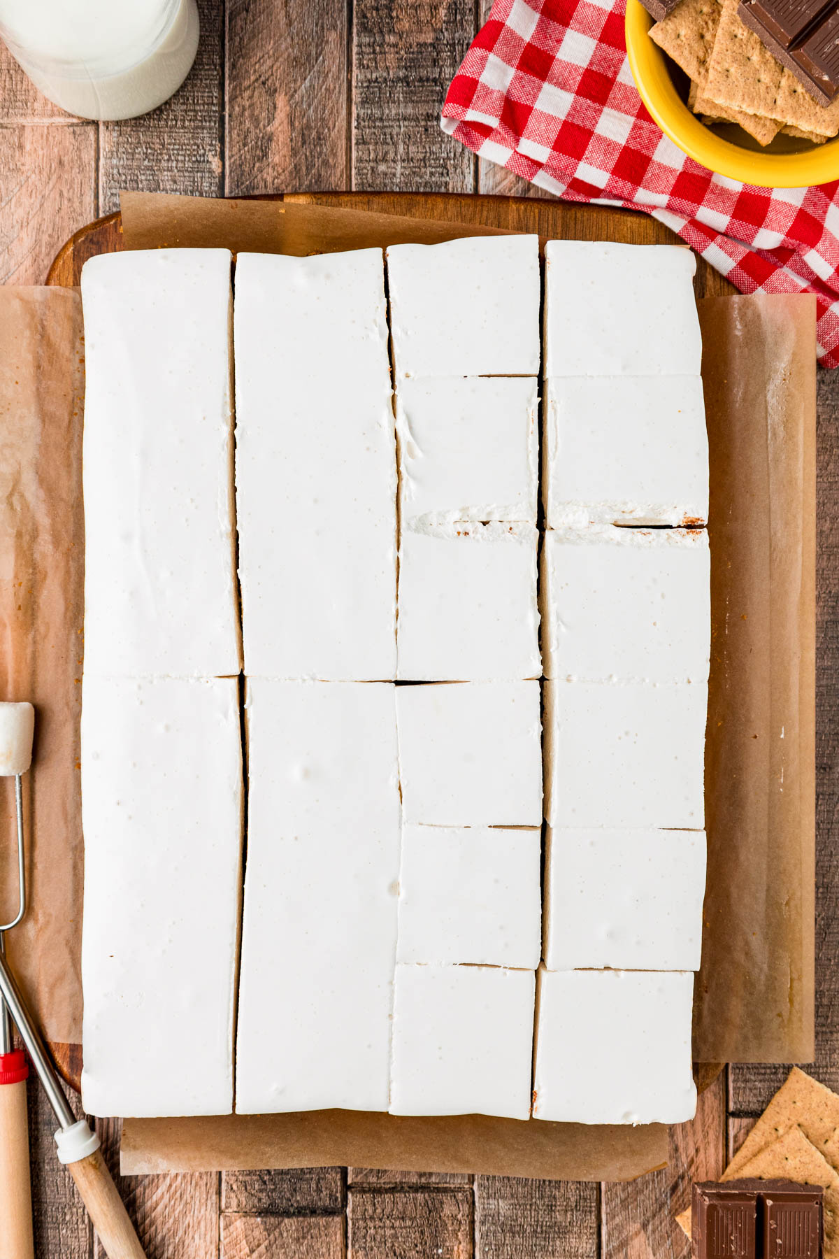 Overhead photo of s'mores brownies being cut into squares.