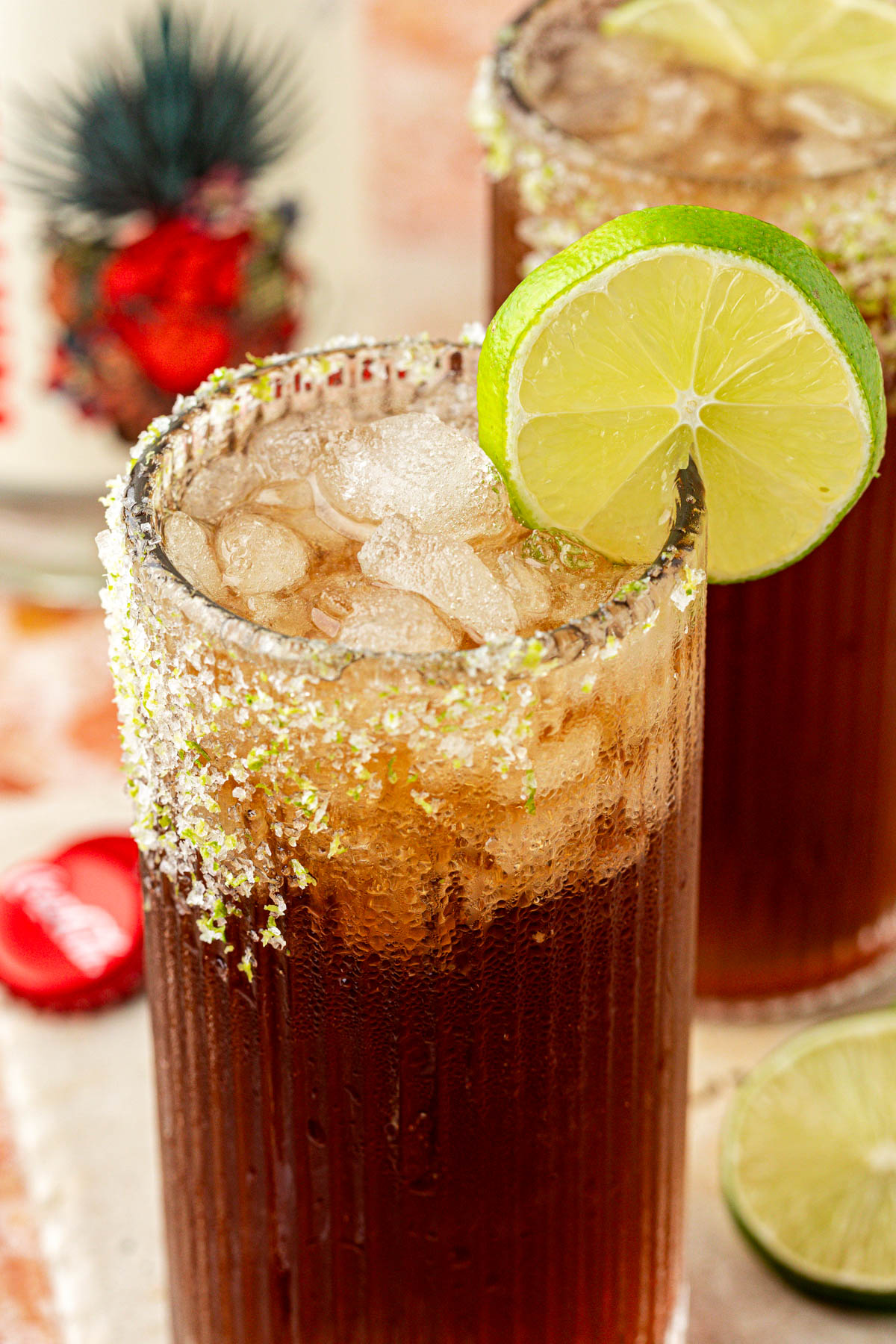 Close up of a glass with a Batanga drink in it.