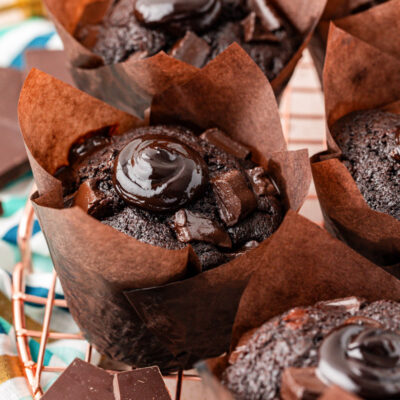 Olympic Chocolate Muffin on a wire rack.