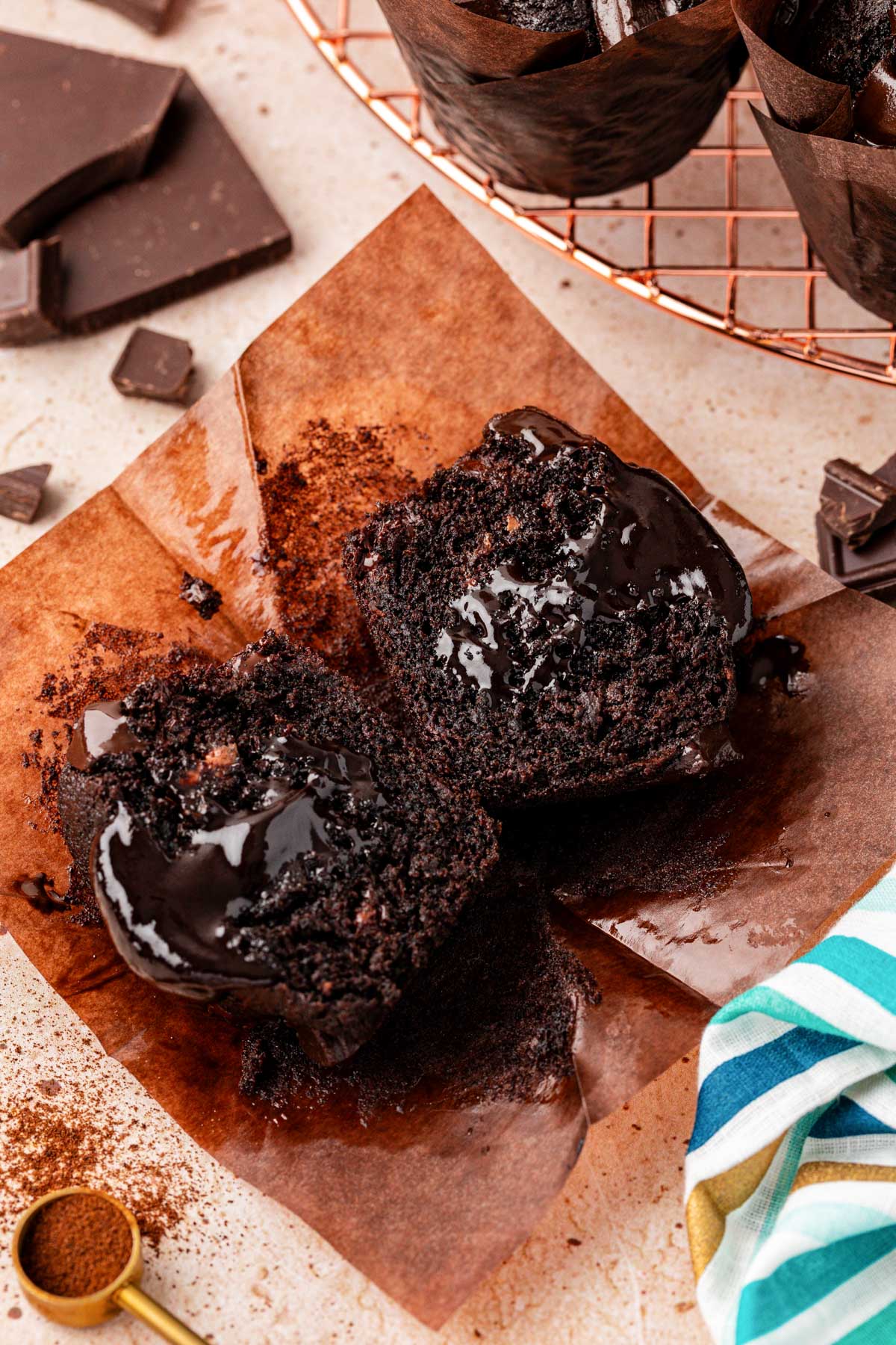 Close up of an olympic chocolate muffin that's been cut in half.