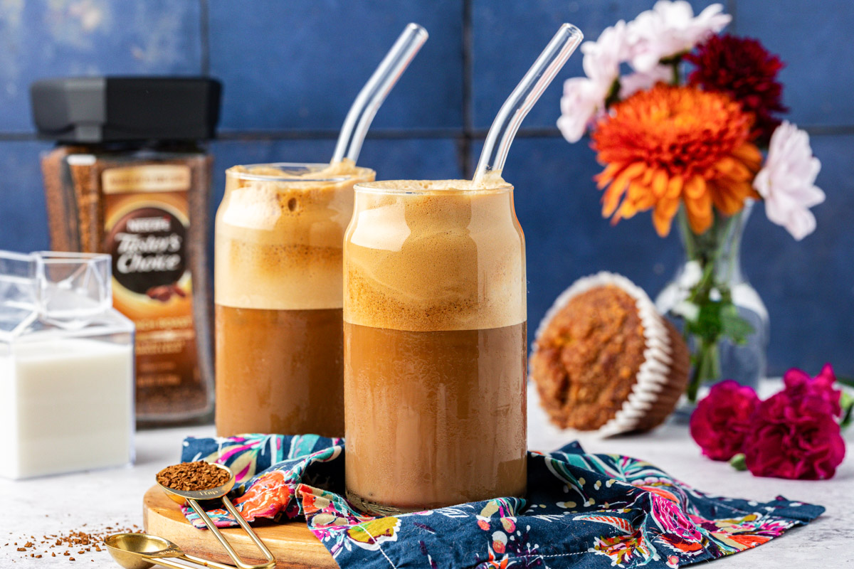 Close up of two glasses filled with Greek Frappe coffee.