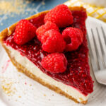 Close up of a slice of raspberry cream pie.