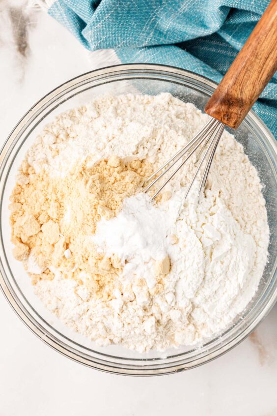 Overhead photo of dry ingredients being whisked in a bowl.