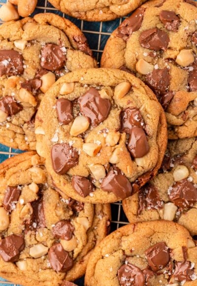 Overhead photo of a wire rack covered in Sausalito macadamia chocolate chip cookies.