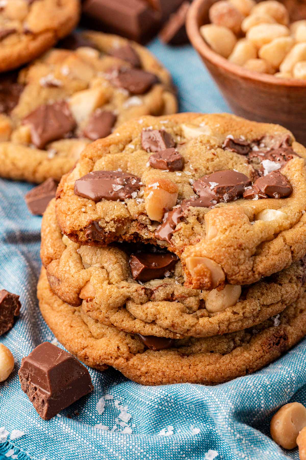 Close up of a stack of Homemade Sausalito Cookies on a blue napkin.