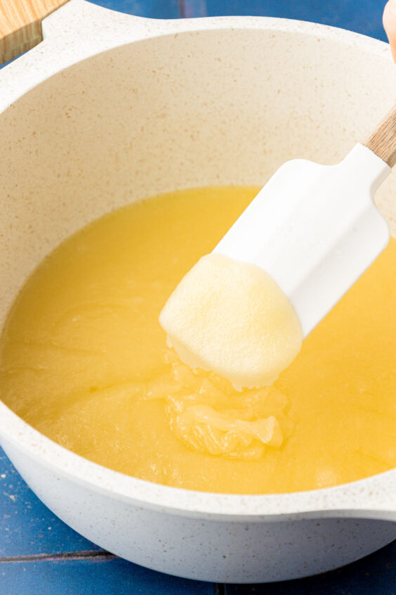 Butter and sugar melted in a pot.