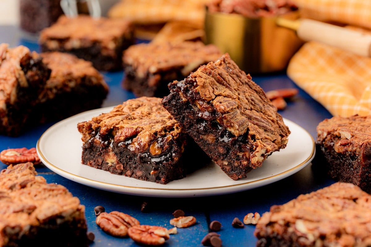 Pecan pie brownies on a white plate.