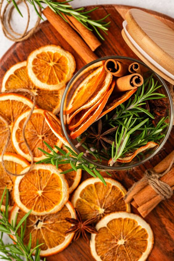 Dried orange slices and other supplies to make holiday decor.