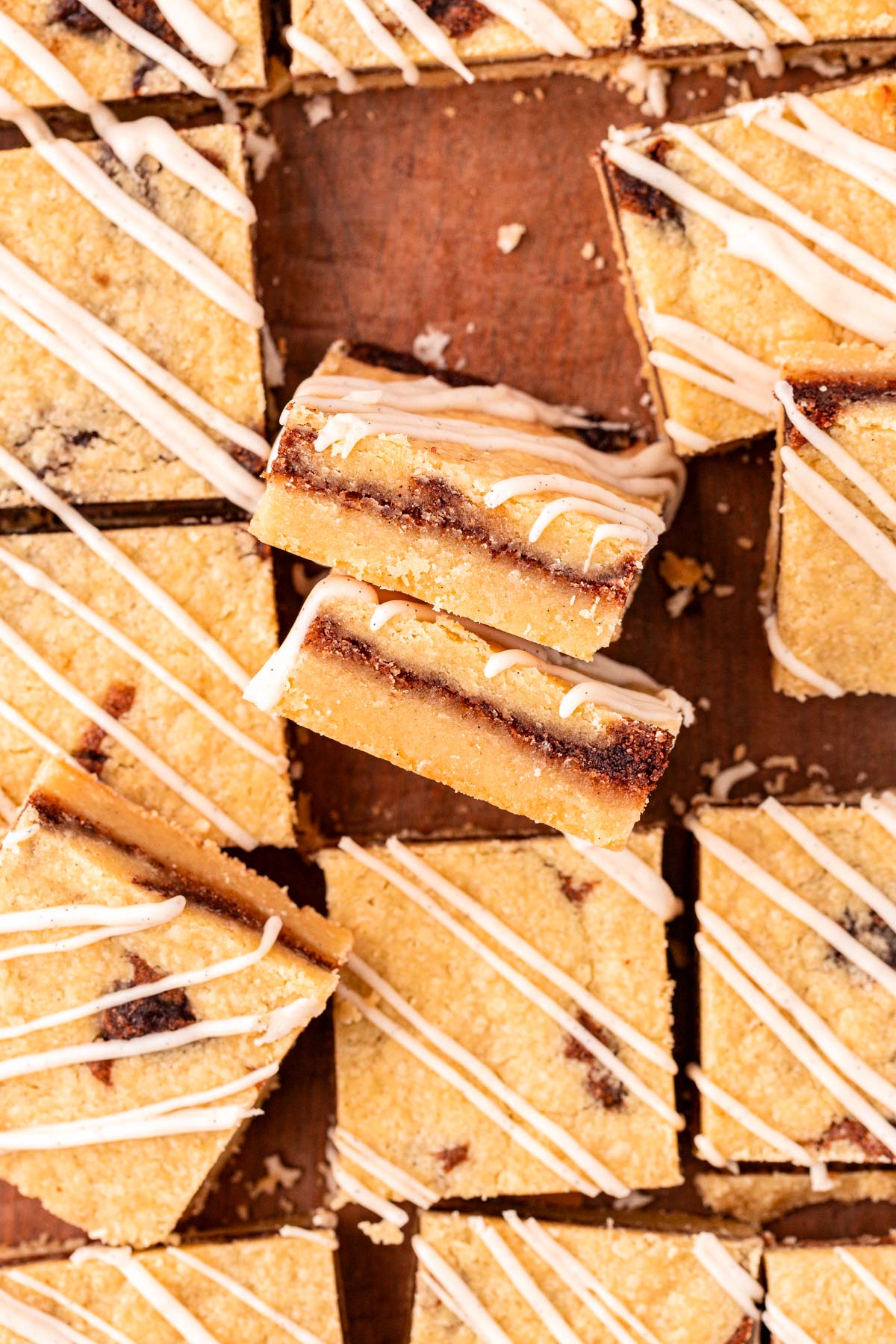 Overhead photo of cinnamon roll shortbread cookie bars on a table.