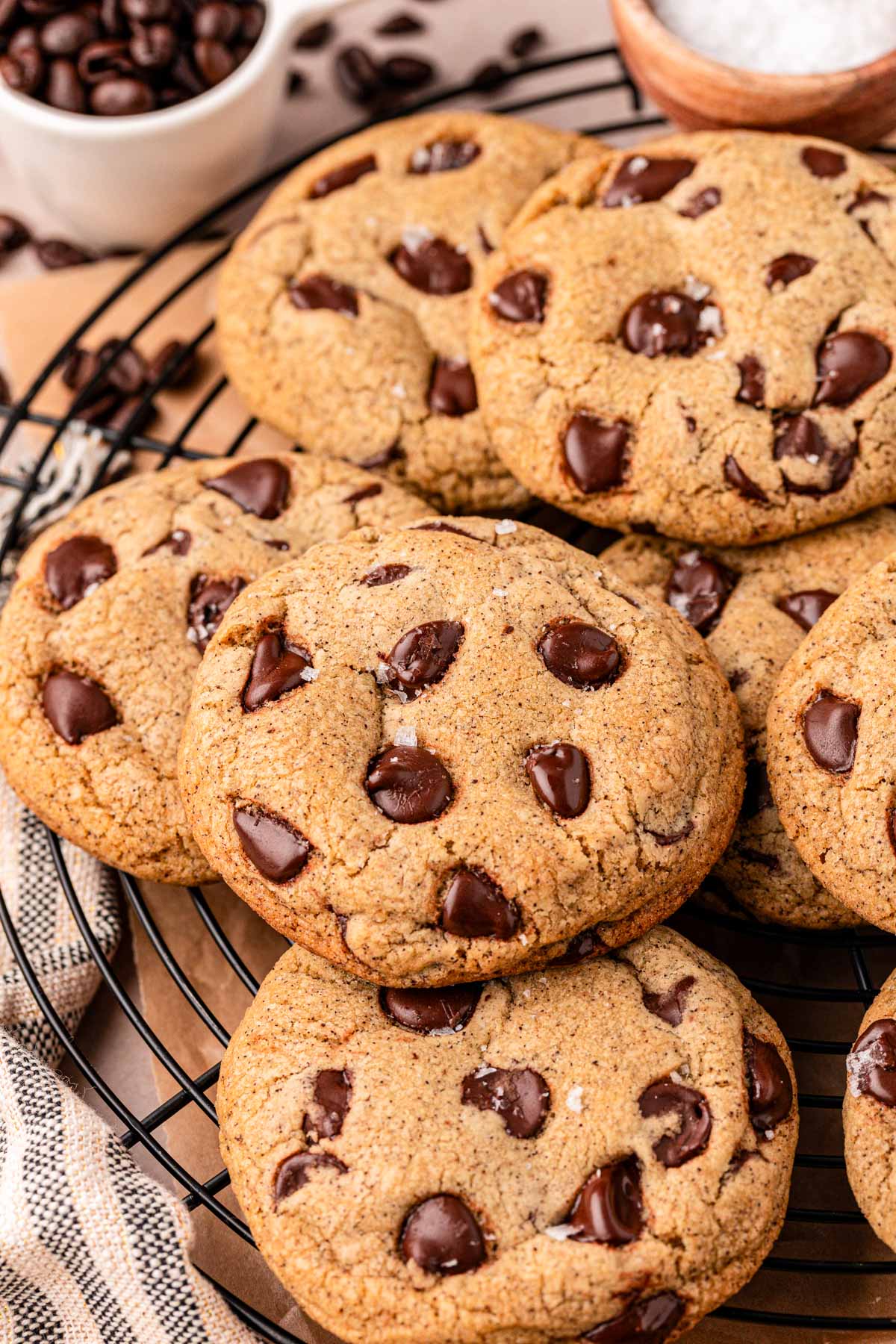 Close up of coffee chocolate chip cookies on a wire rack.