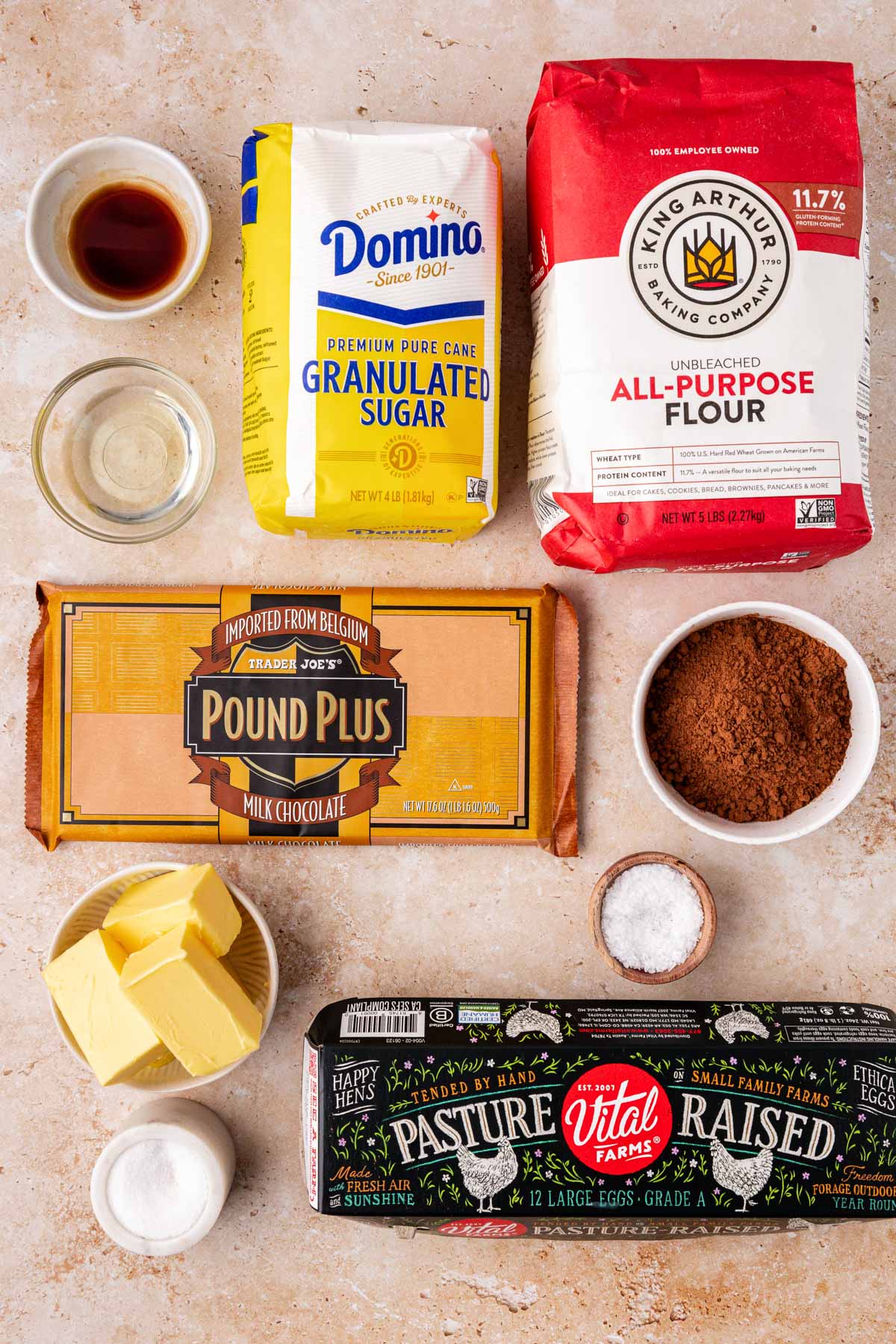 Ingredients to make chocolate chunk brownies on a table.