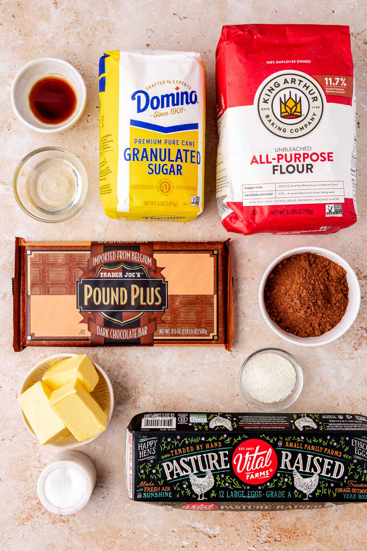 Ingredients to make sheet pan brownies on a table.