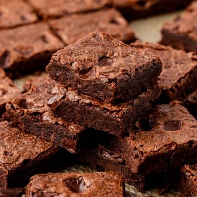 Stacks of brownies on a sheet pan.