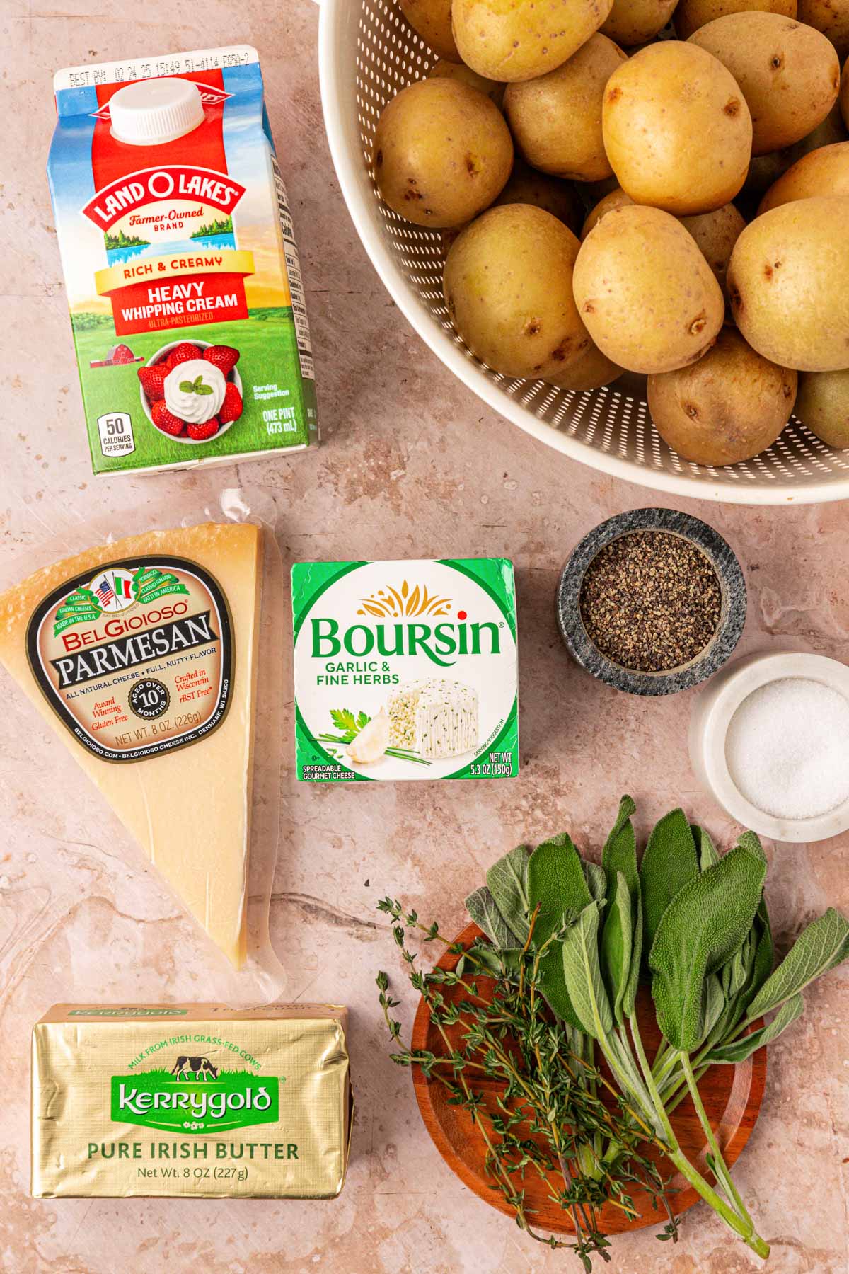 Ingredients to make brown butter boursin mashed potatoes on a table.