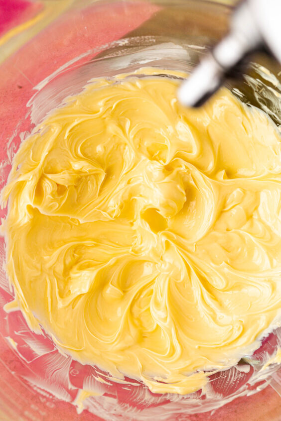 Butter creamed in a stand mixer bowl.