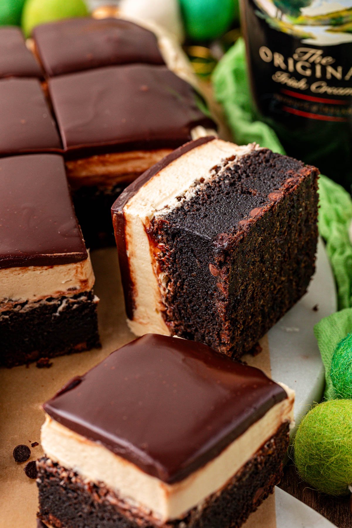 Close up of brownies with irish cream frosting and ganache.