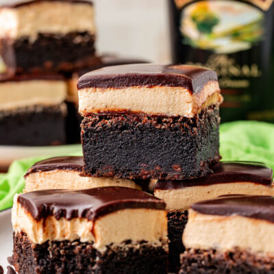 Close up of a white plate with bailey's brownies on it.