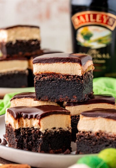 Close up of a white plate with bailey's brownies on it.