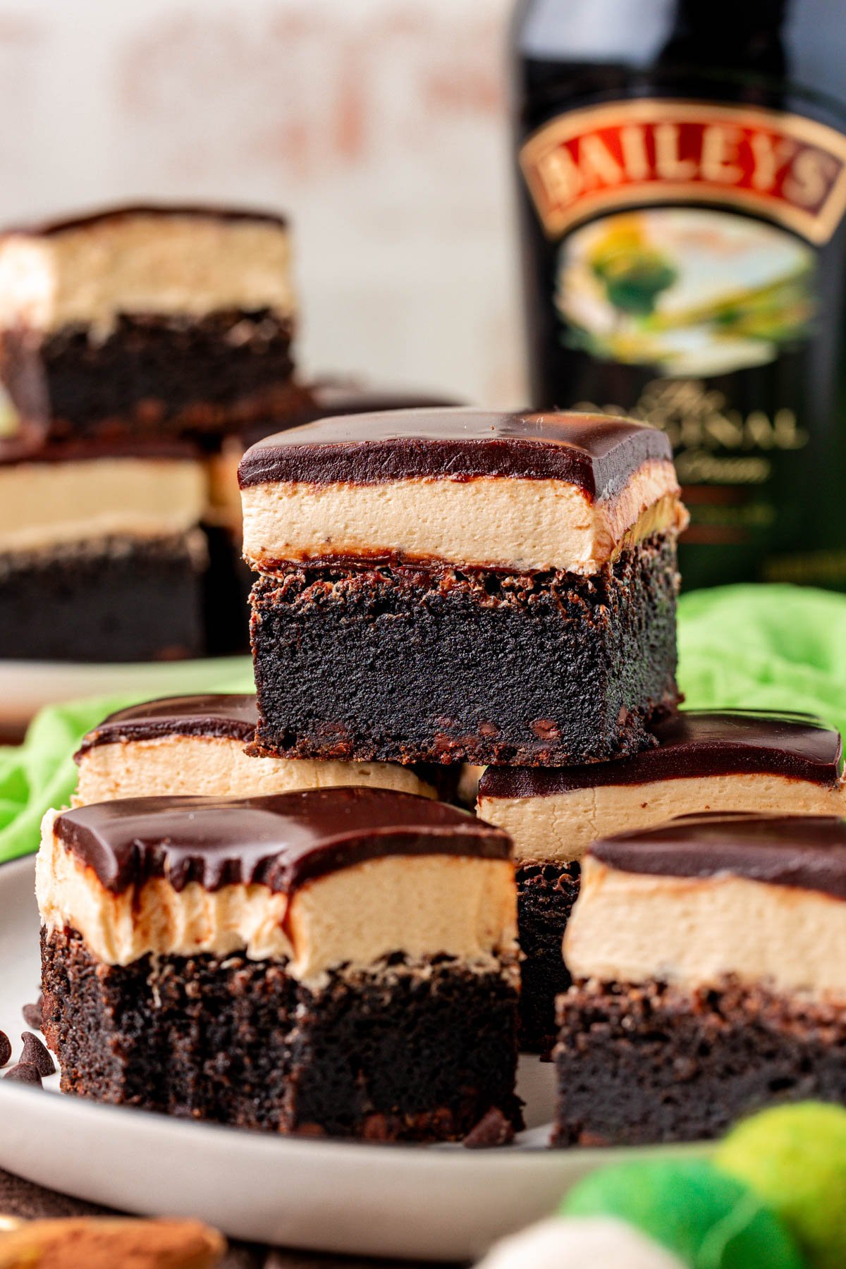 Close up of a white plate with bailey's brownies on it.